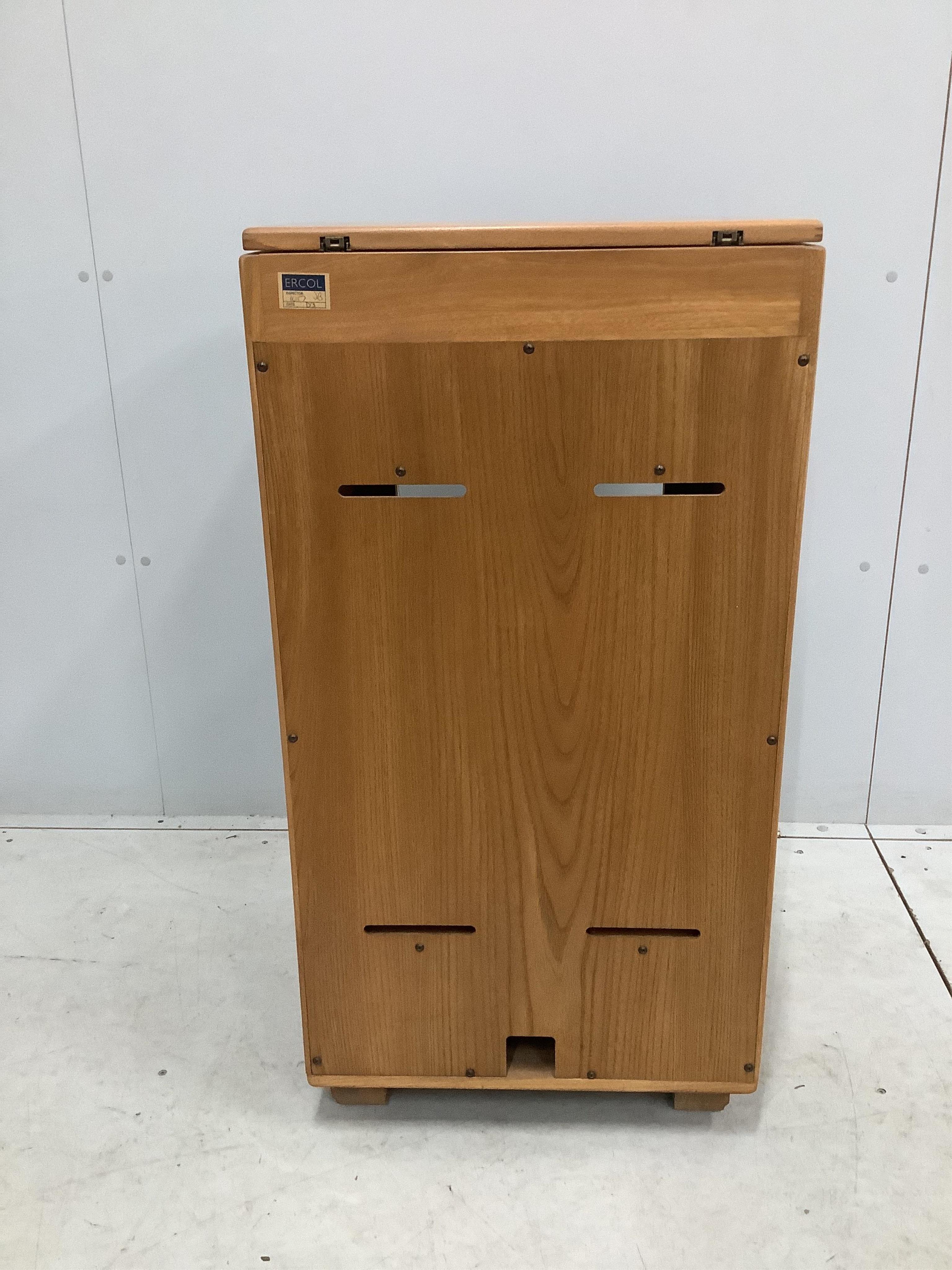 An Ercol Windsor elm Hi-Fi unit, width 50cm, depth 47cm, height 98cm. Condition - good